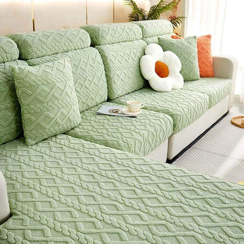 Luxury plush stretch sofa cover in soft green