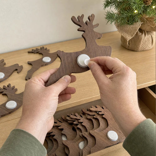 LED illuminated wall decorations featuring Santa Claus and his reindeer