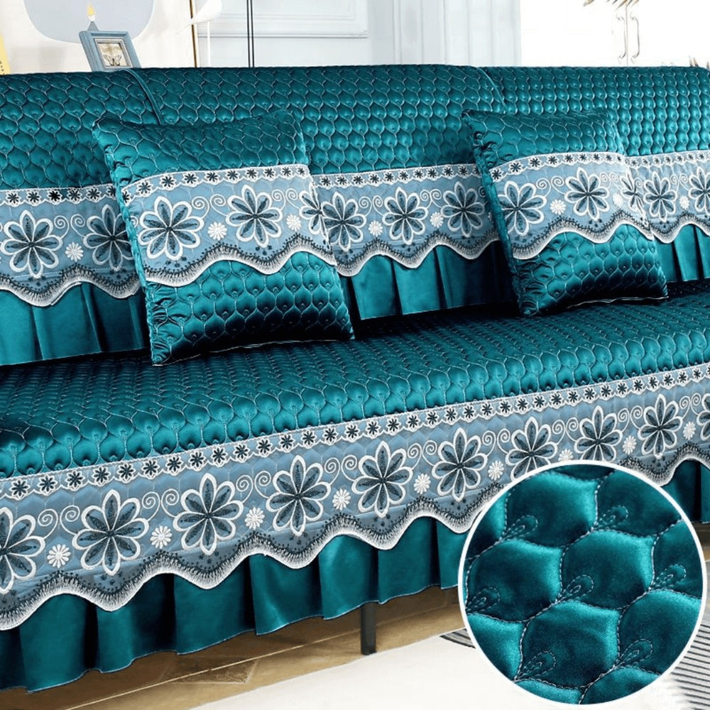 Detailed floral embroidery and quilted sofa cover