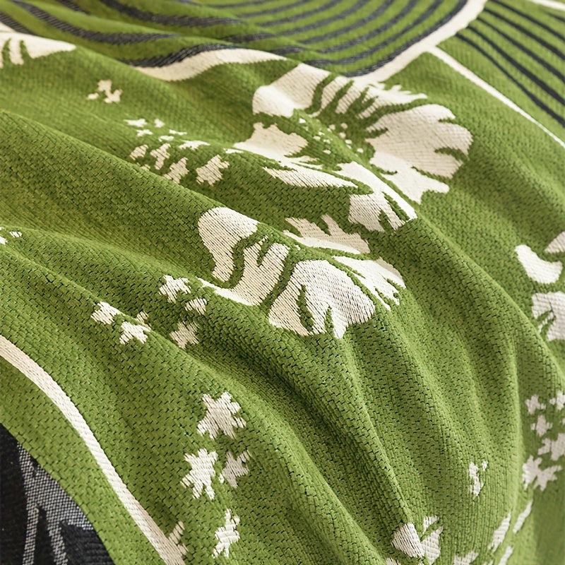 Detailed woven botanical sofa throw texture