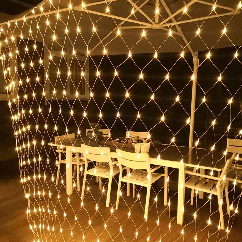 LED net lights arranged around an outdoor dining area
