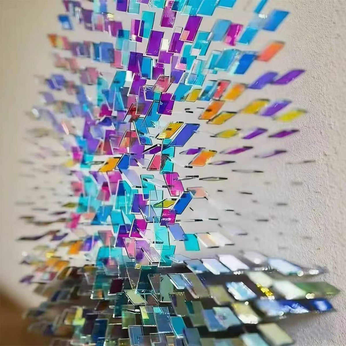 Colorful holographic acrylic installation reflecting light