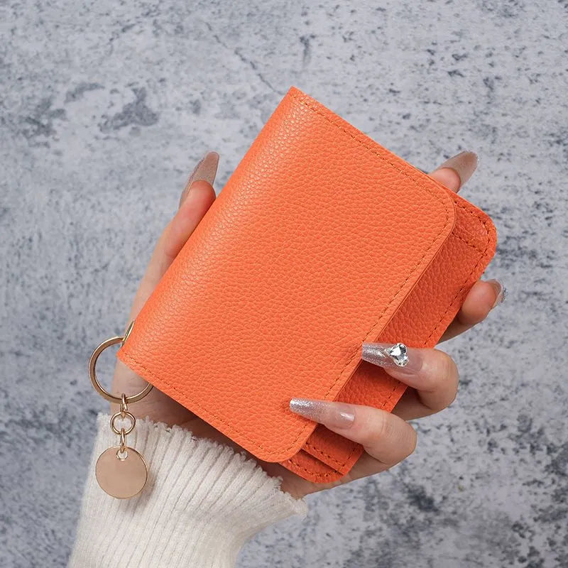🎁HOT SALE🔥Elegant and Minimalist Women's Slim Short Wallet – with RFID protection, card slots, a bill compartment, and an ID window