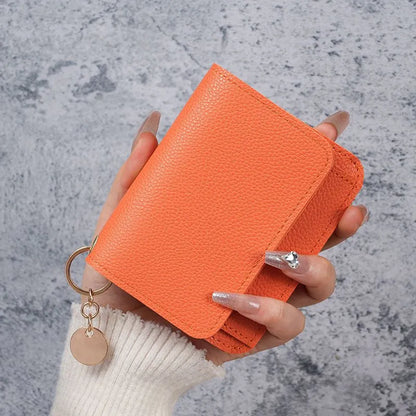 🎁HOT SALE🔥Elegant and Minimalist Women's Slim Short Wallet – with RFID protection, card slots, a bill compartment, and an ID window