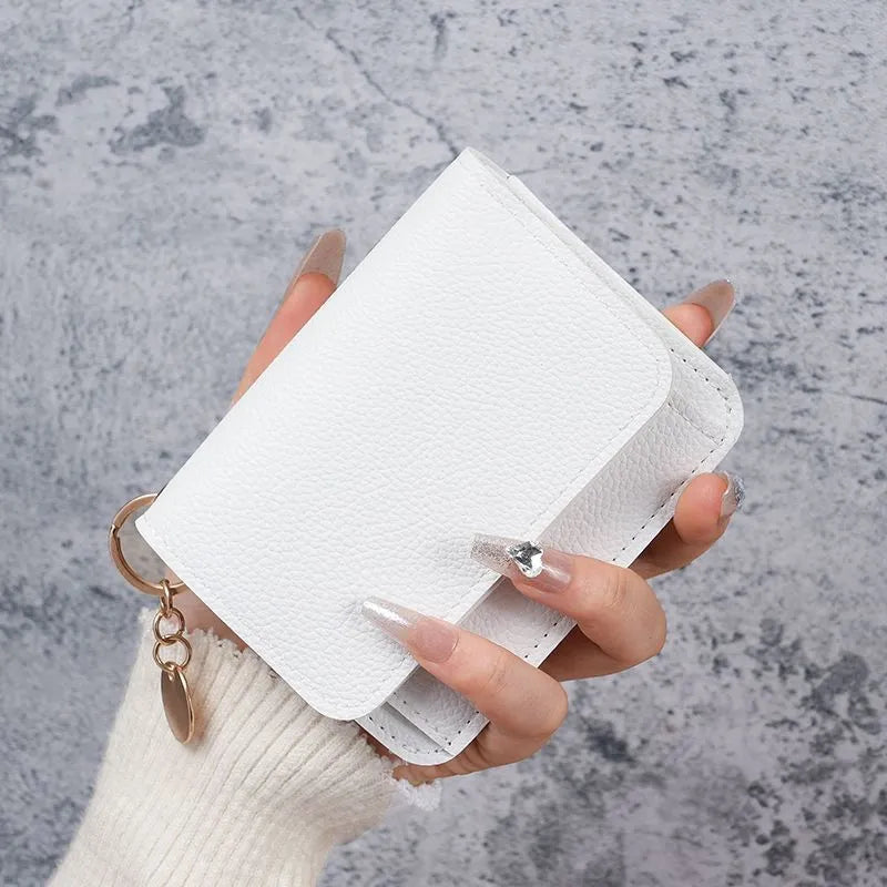 🎁HOT SALE🔥Elegant and Minimalist Women's Slim Short Wallet – with RFID protection, card slots, a bill compartment, and an ID window