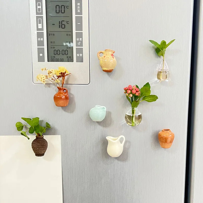 Mini vase fridge magnets decorating a refrigerator