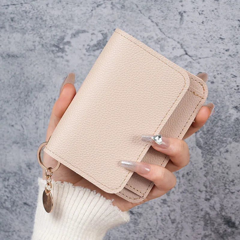 🎁HOT SALE🔥Elegant and Minimalist Women's Slim Short Wallet – with RFID protection, card slots, a bill compartment, and an ID window