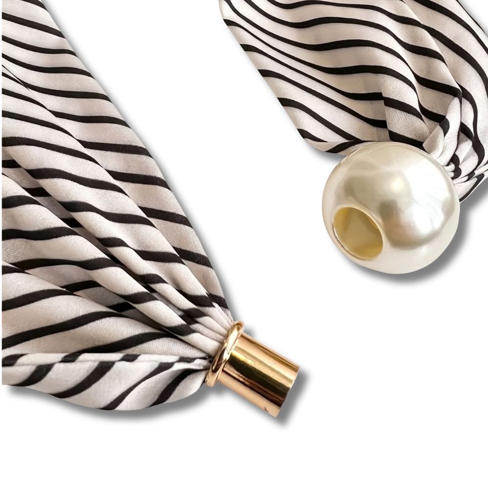 Elegant pearl scarf necklace worn around the neck
