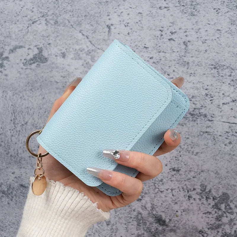 🎁HOT SALE🔥Elegant and Minimalist Women's Slim Short Wallet – with RFID protection, card slots, a bill compartment, and an ID window